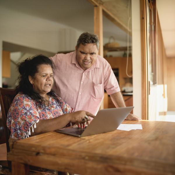 Image of aboriginal woman on a computer 